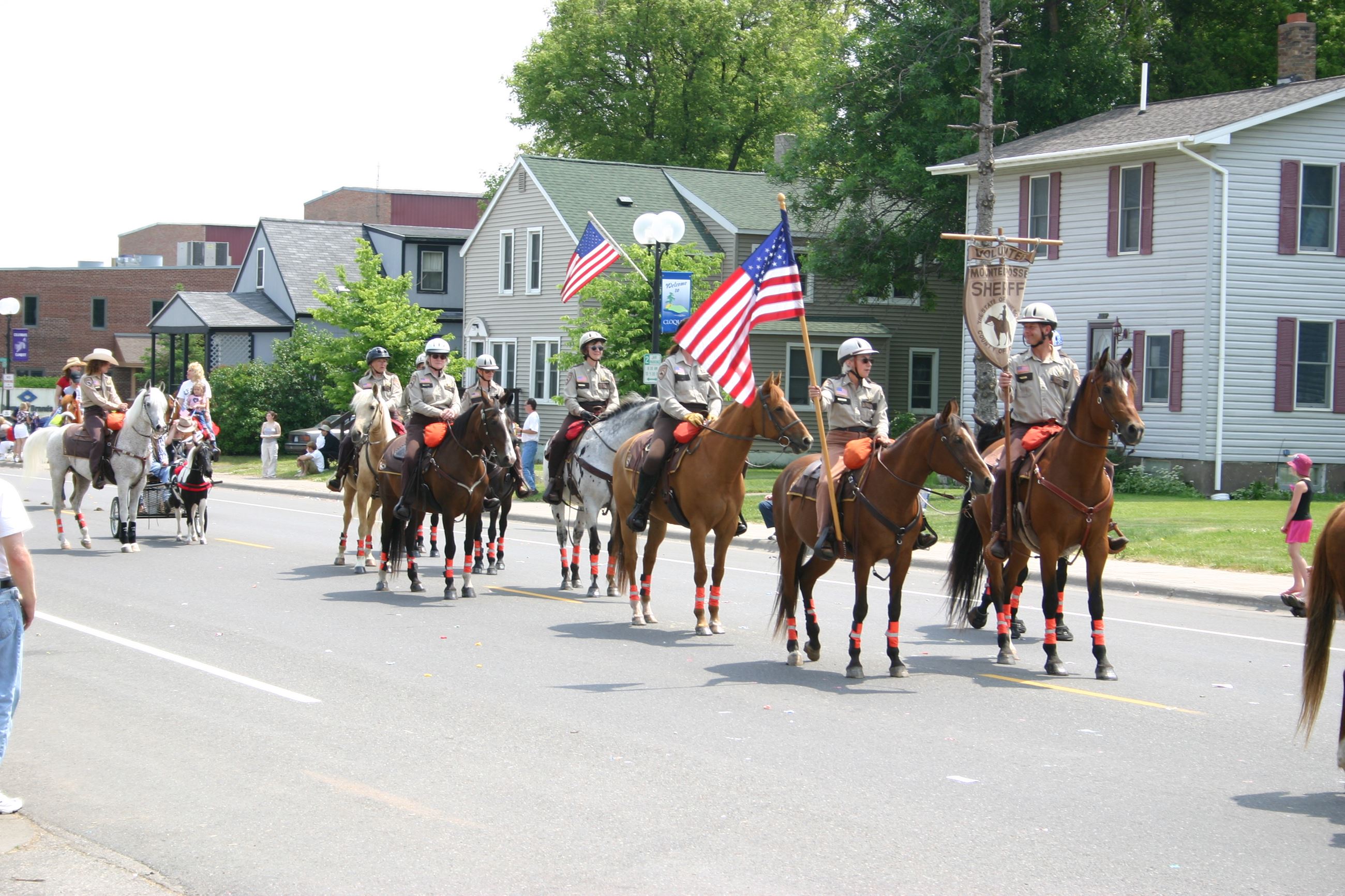 Sheriffs posse in a parade on road