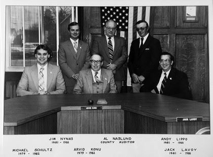 Black and white image of commissioners of the 1970s