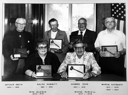 Black and white image of five commissions in 1970s